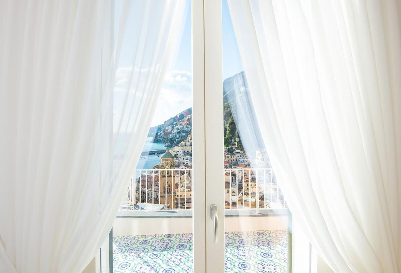 Amore Rentals - Palazzo Della Storia Amalfi Exteriör bild